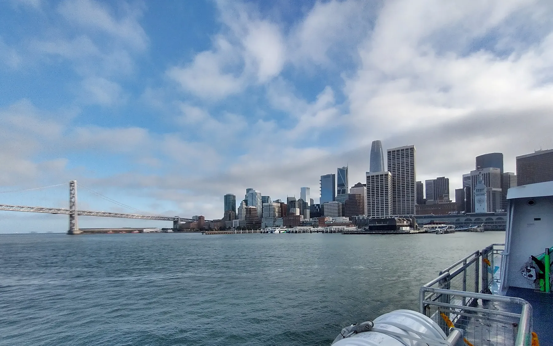 The San Francisco skyline and Bay Bridge seen from a ferry.