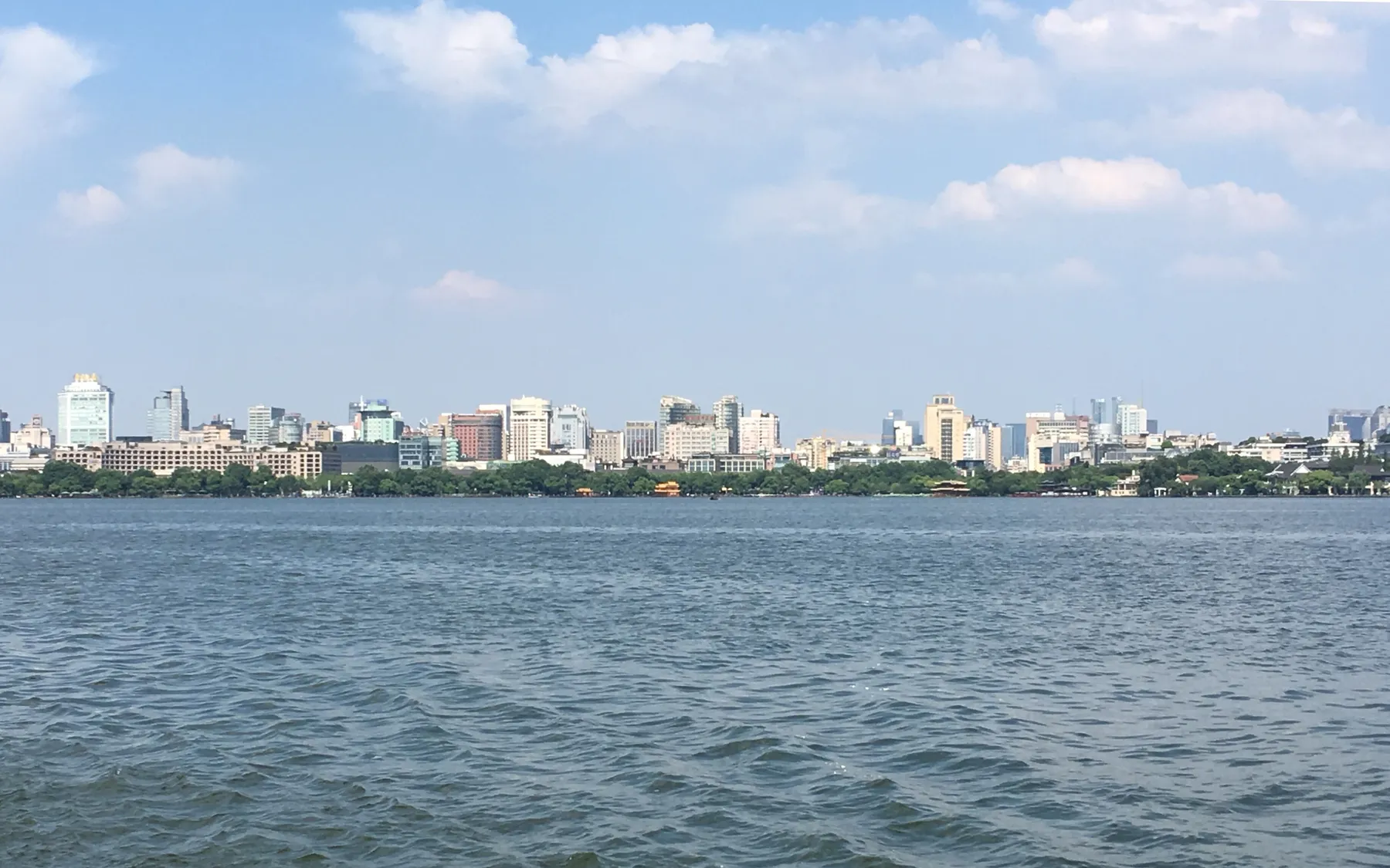 West Lake and the Hangzhou skyline.