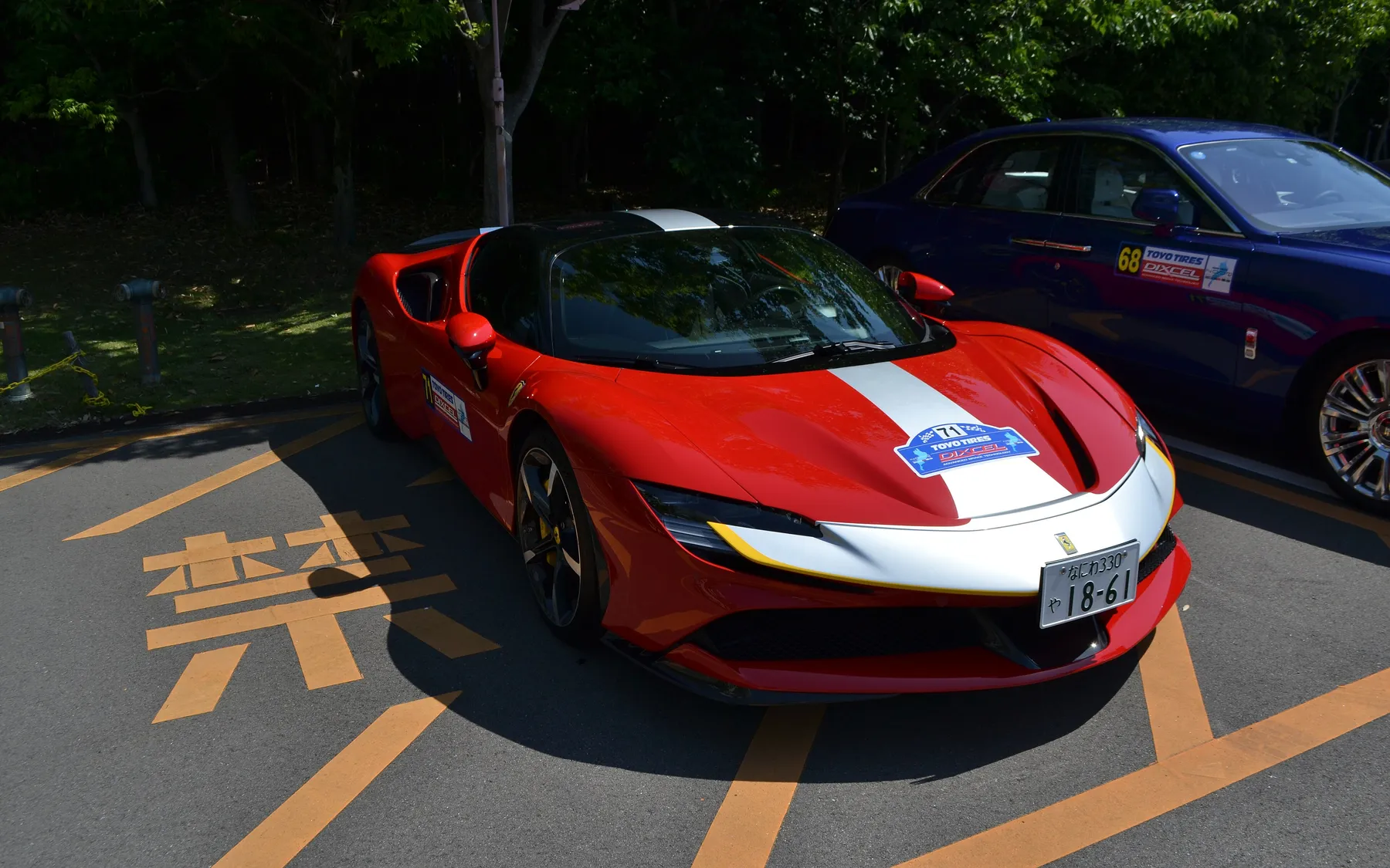A red Ferrari SF90 Stradale on display.