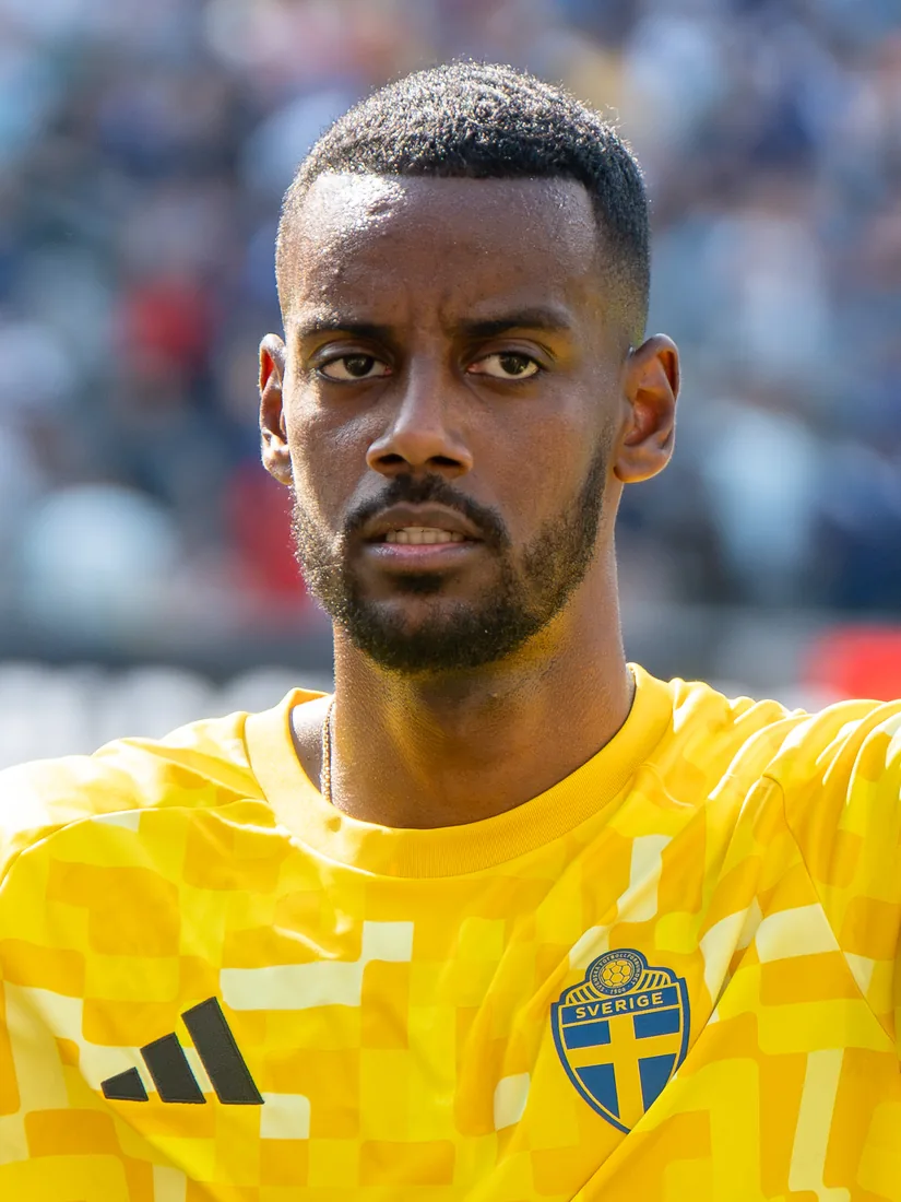 Alexander Isak in a yellow Sweden training top.