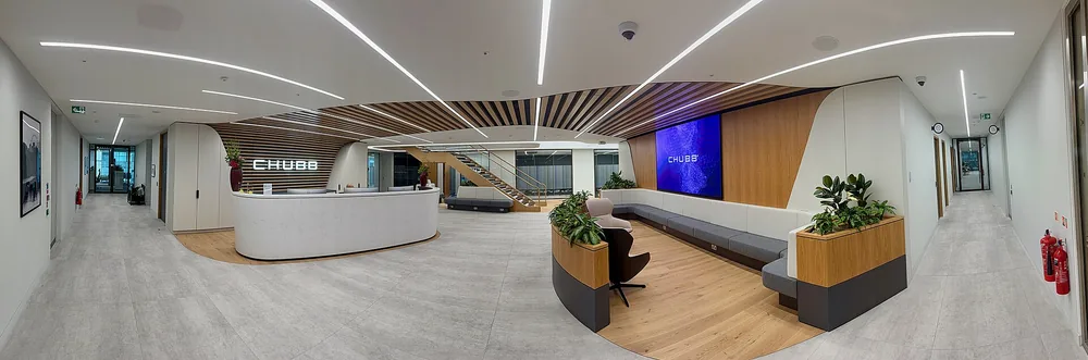 A panoramic view of the reception lobby in Chubb’s London office.