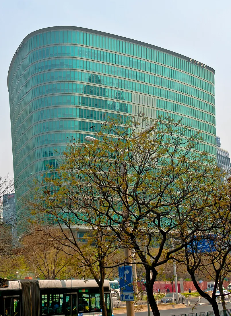 CNOOC’s headquarters building in Beijing; the parent and listed company are distinct entities.