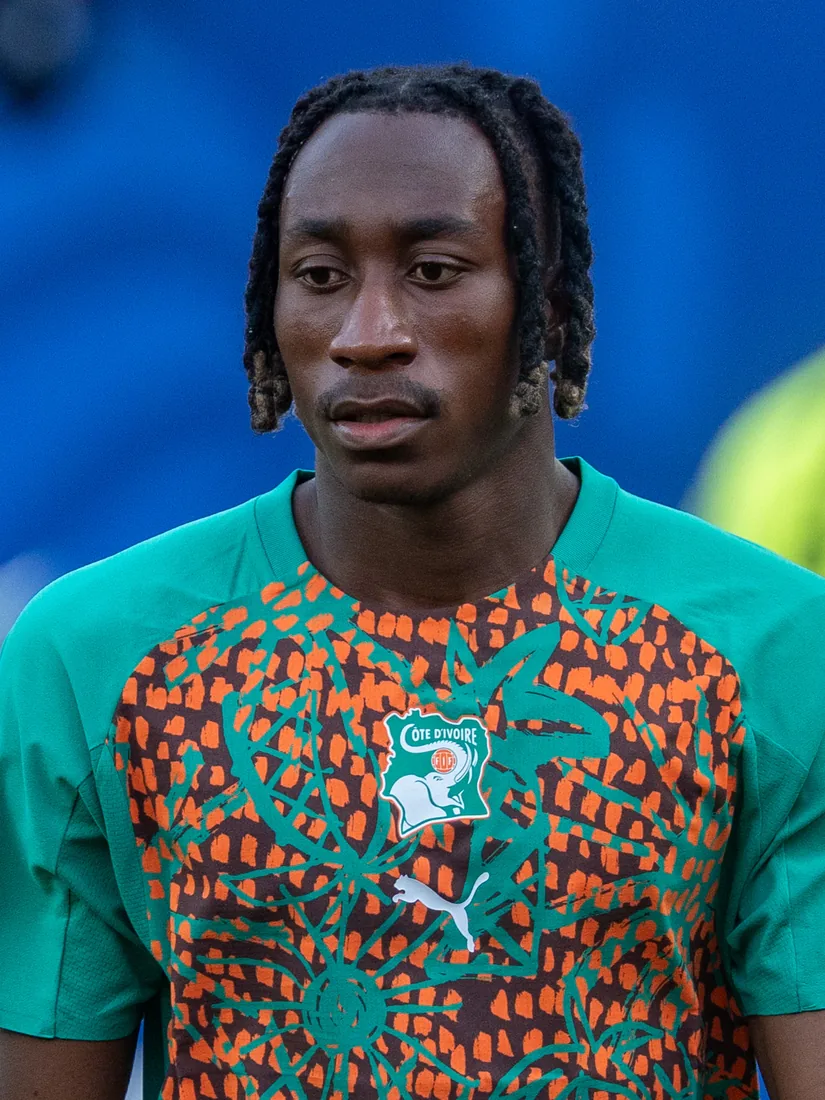 Yan Diomande in an Ivory Coast warm-up shirt.