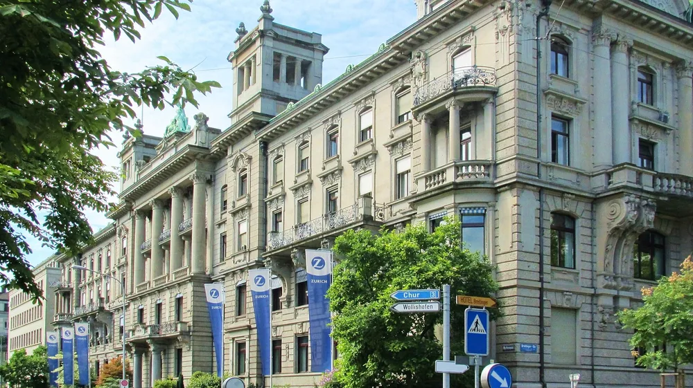 The Zurich Insurance building on Mythenquai in Zürich, hung with Zurich banners.