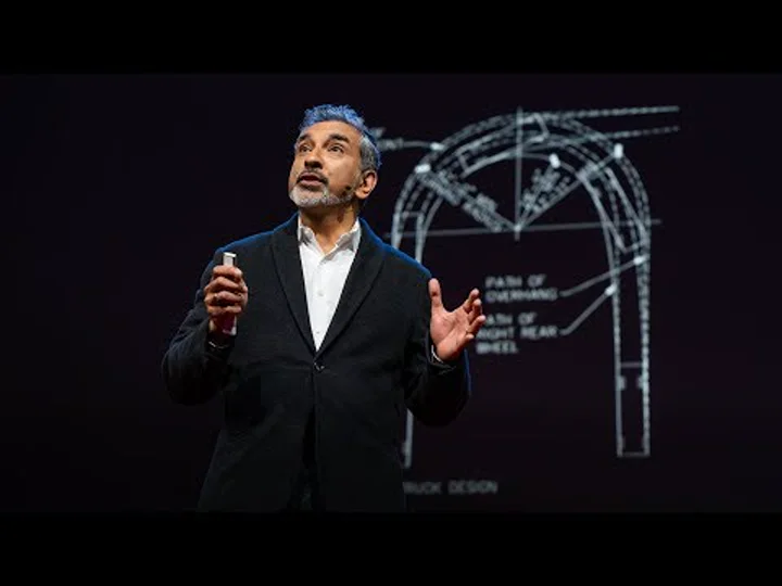 Architect Vishaan Chakrabarti speaking on the TED stage.